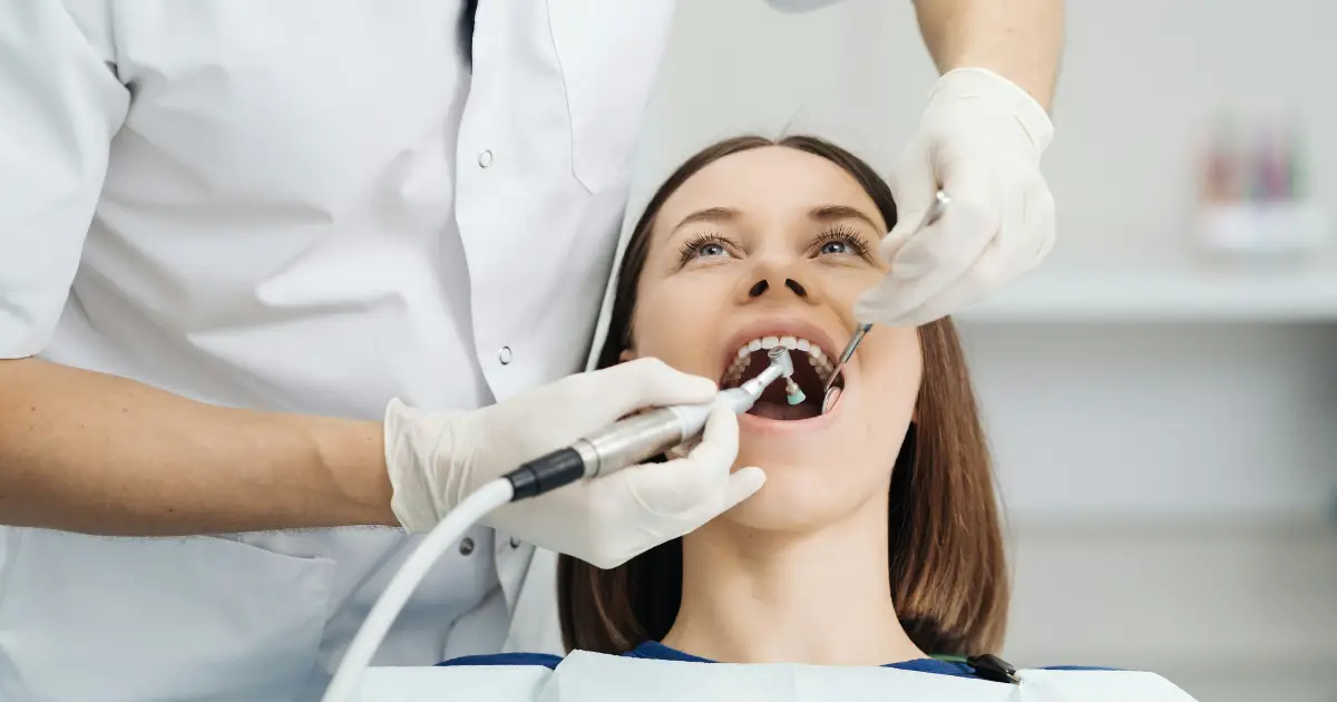 woman receiving a routine dental exam